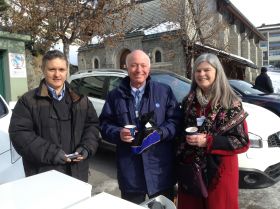 All smiles at the Alliance's hot cocoa hut in Davos, powered by LEAF-to-Home technology